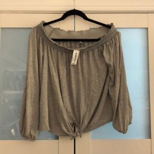 Off the shoulder gray shirt